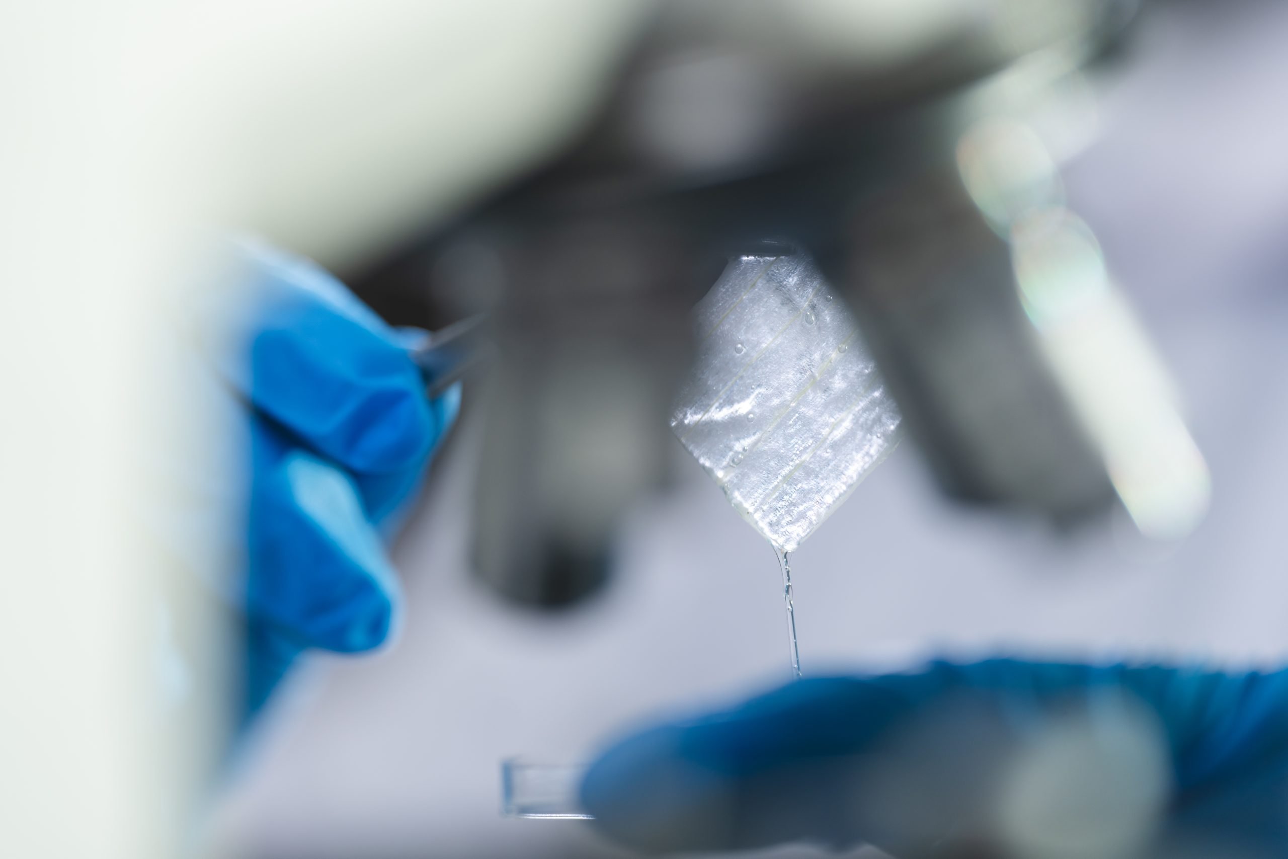 researcher working in laboratory for medicals science research using scientific equipment technology